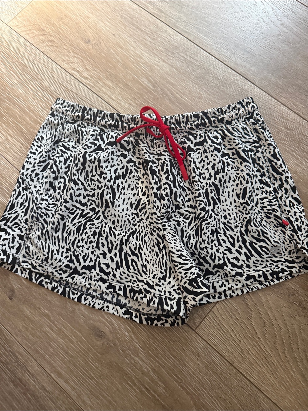 Fabletics Black & White Animal Print Athletic Shorts with Red Drawstring